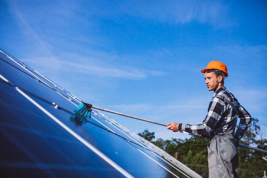 Professionals performing roof cleaning in Auckland