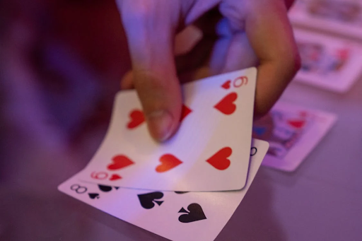 Playing Cards sequentially placed on the table